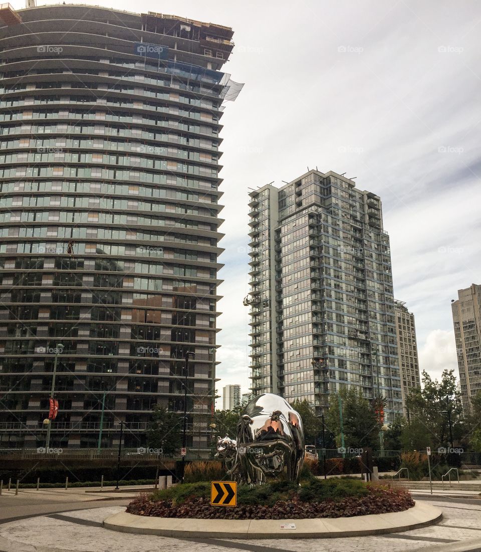 Towering new buildings under interesting looking clouds  in downtown Vancouver, British Columbia 