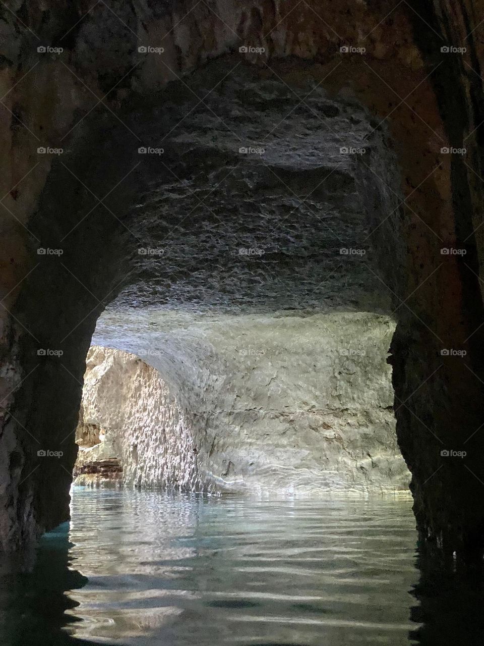 A passage out of an underground water filled cenote in Mexico