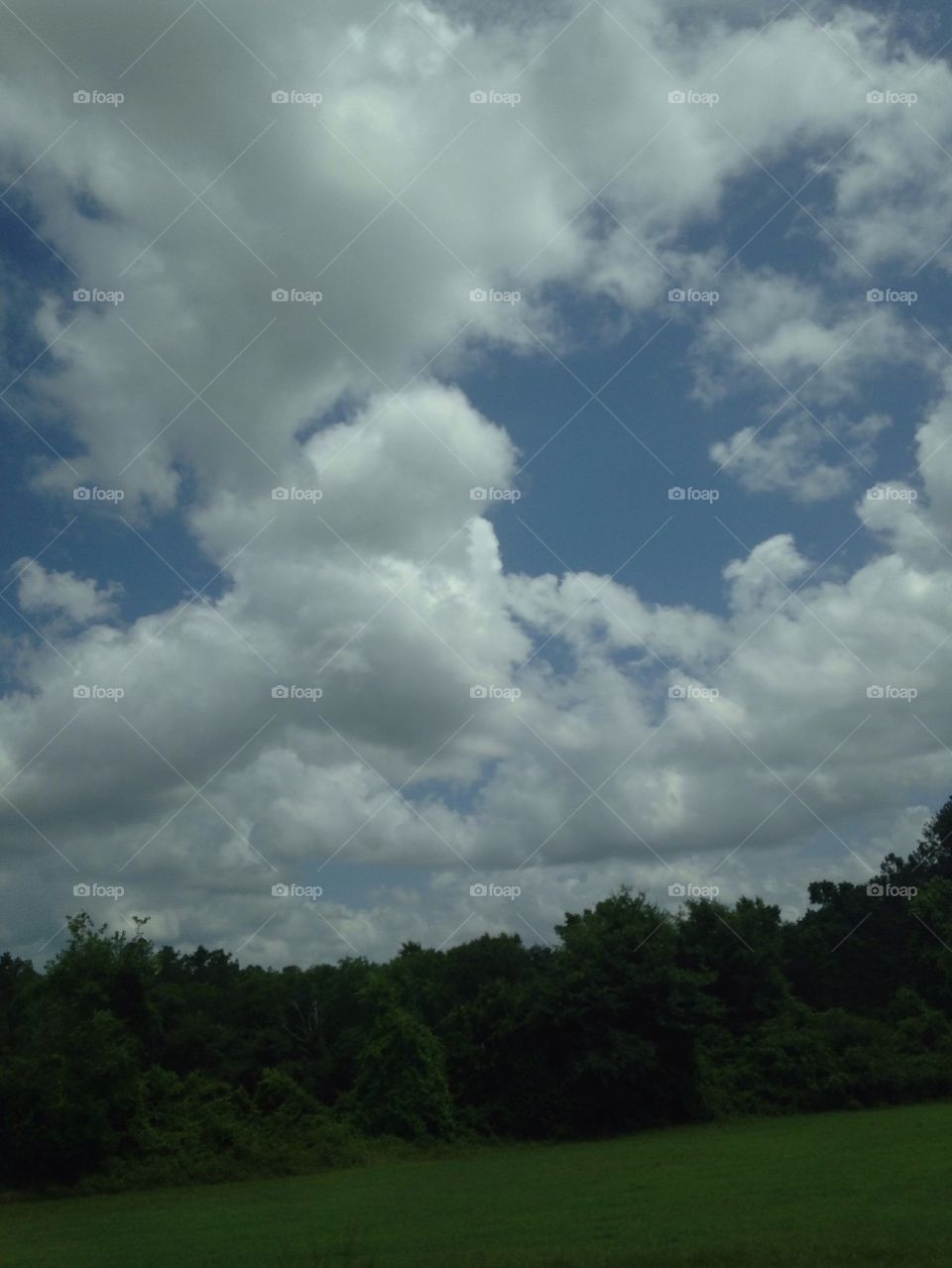 Clouds at a field 