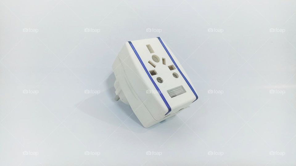 Electrical socket connector on isolated white background in eye level view