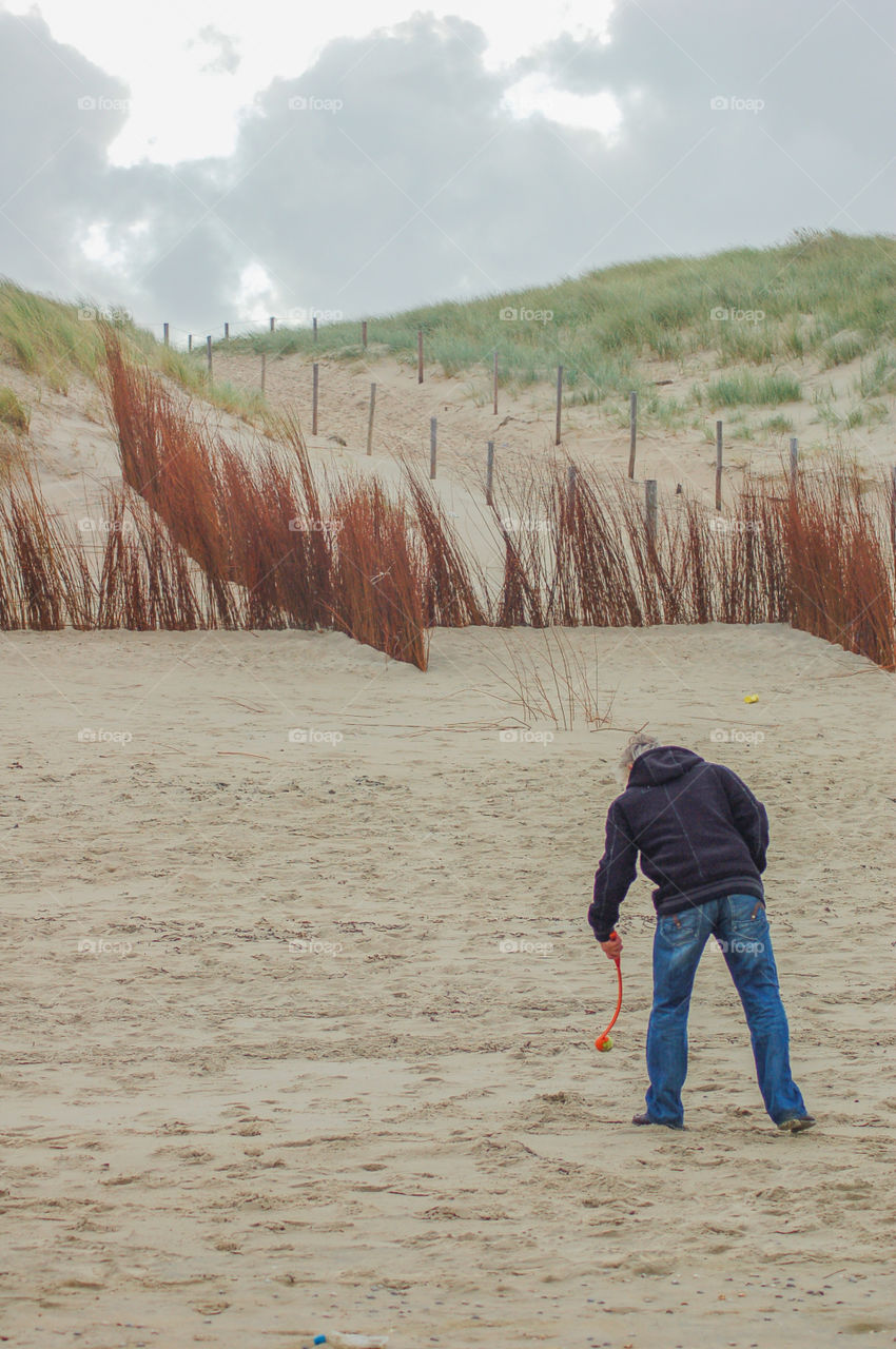 Man On The Beach At Texel The Netherlands