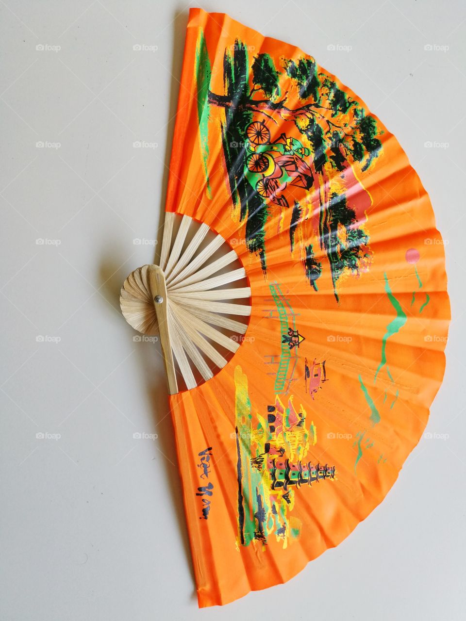 Orange decorated fan