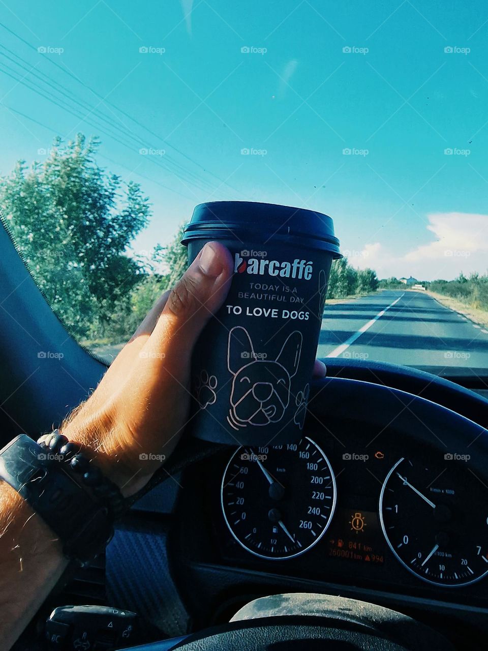 coffee behind the wheel driving