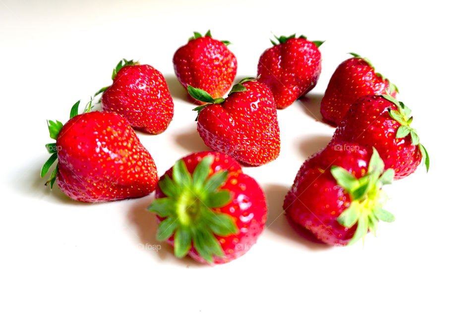 Studio shot of red strawberries on white background