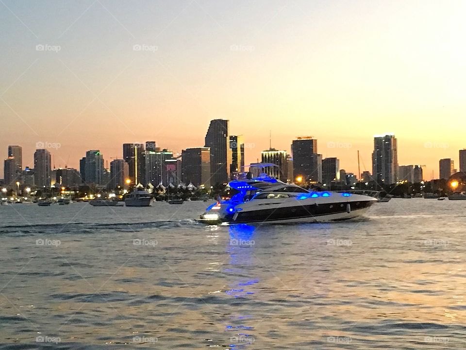 Boating in Miami , sunset skyline 