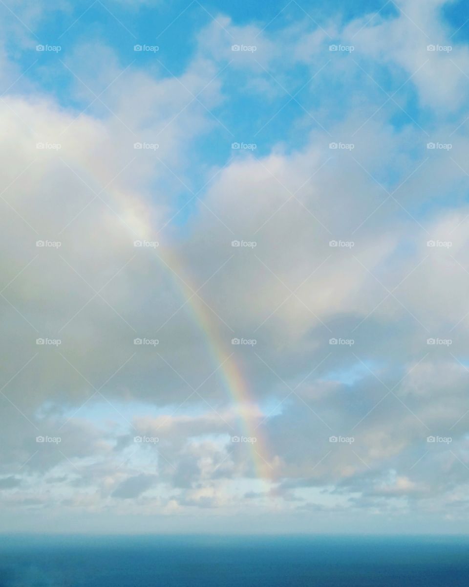 Clouds and rainbow