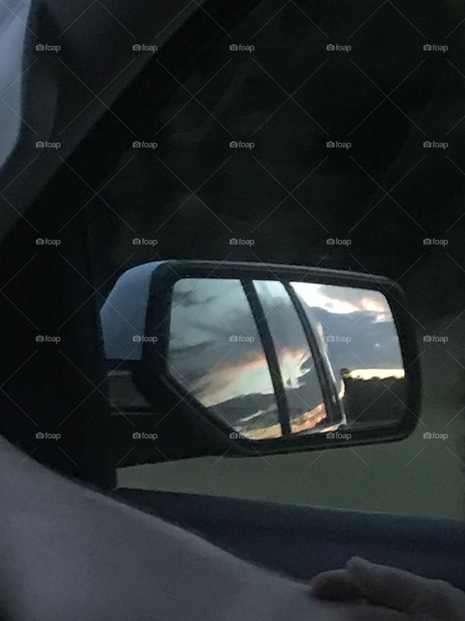 Side mirror sunset I love taking this type of photo it always amazes me with how good it turns out.  🌅