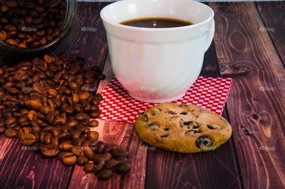 coffee been still life on wooden background