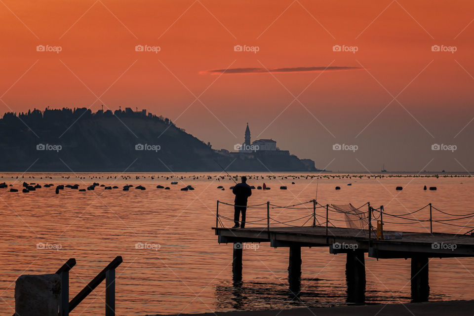 Fisherman at sunset