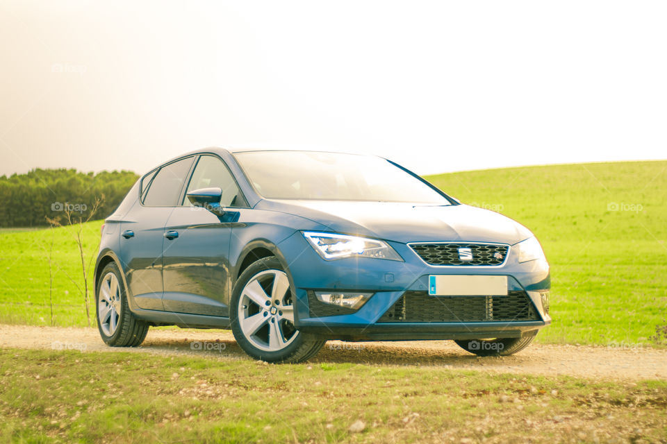 Blue Sport car front side view