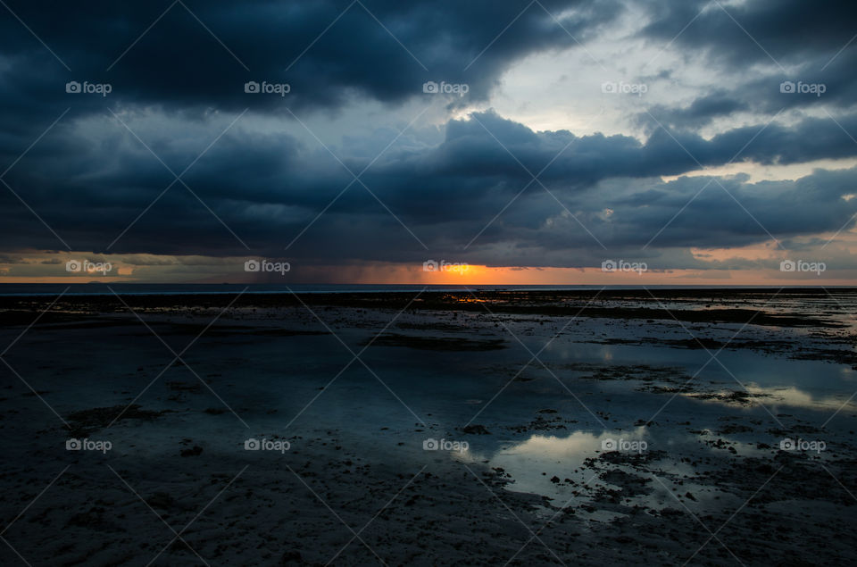 rain clouds on beach