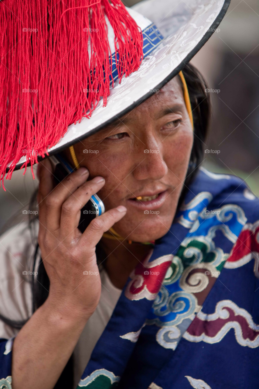 Tibetan on the phone