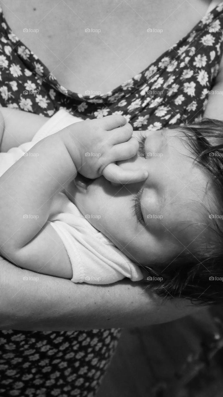 Sleeping baby sucking thumb 