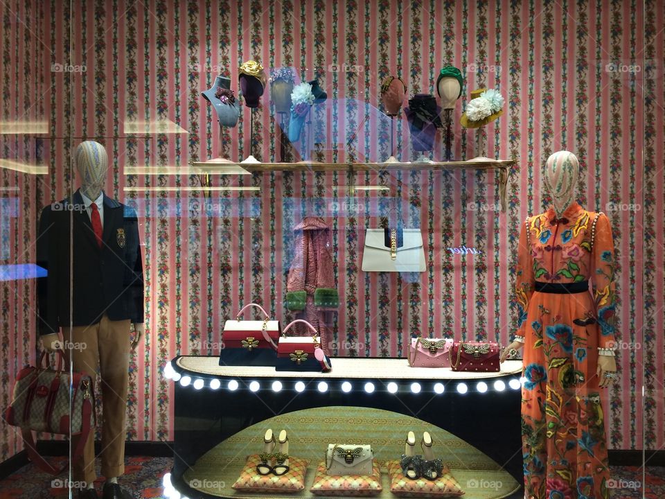 Amazing window display of clothes, bags and shoes in the Gucci boutique at the Mall of the Emirates in Dubai.