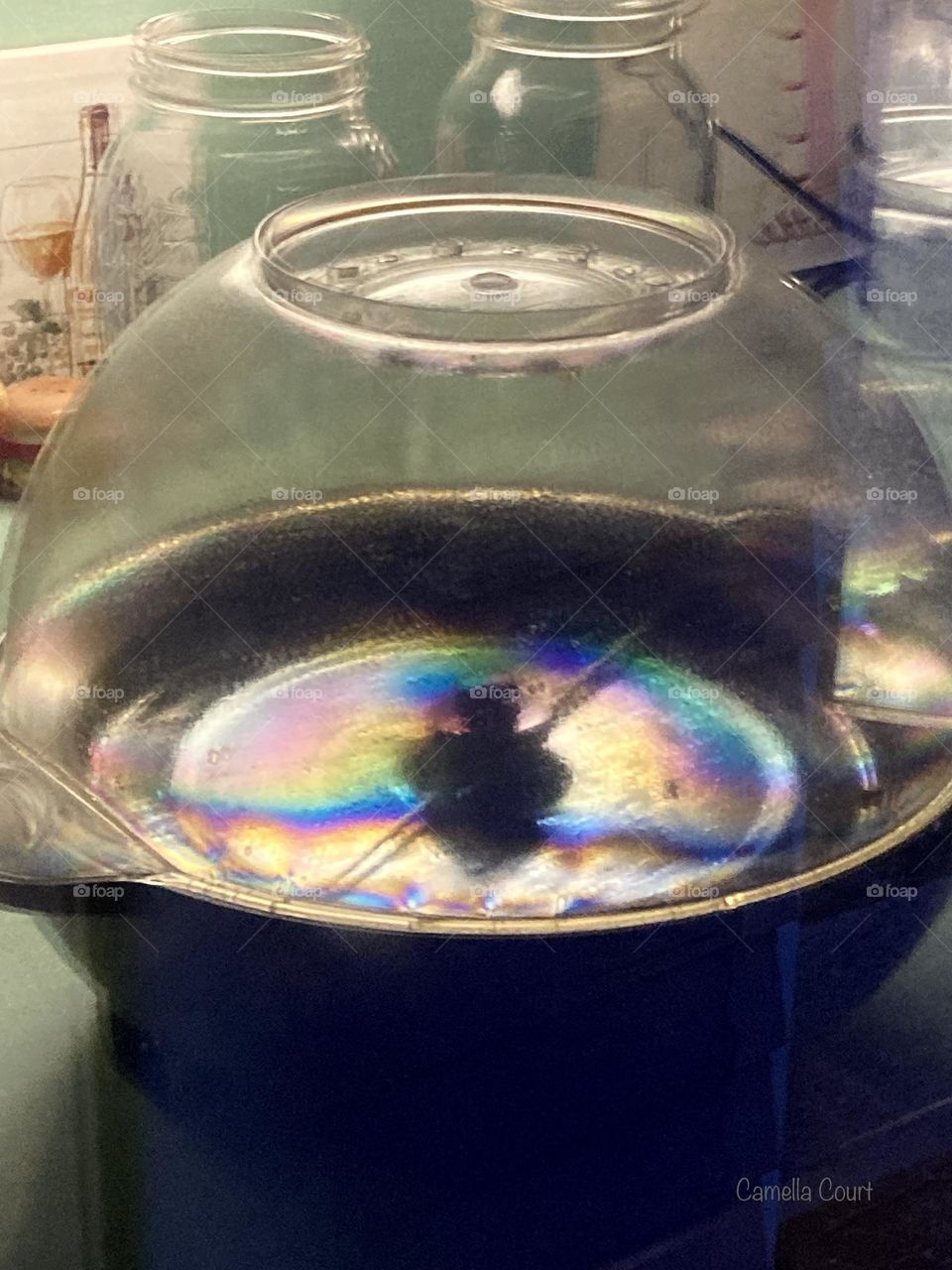 Rainbow Popcorn Oil reflection in my kitchen window
