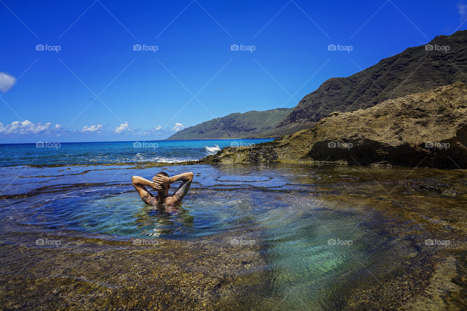 Remember to enjoy nature. Tide pools in western Oahu at pray for sets beach! Gorgeous landscape and turquoise waters show relaxation at its finest 