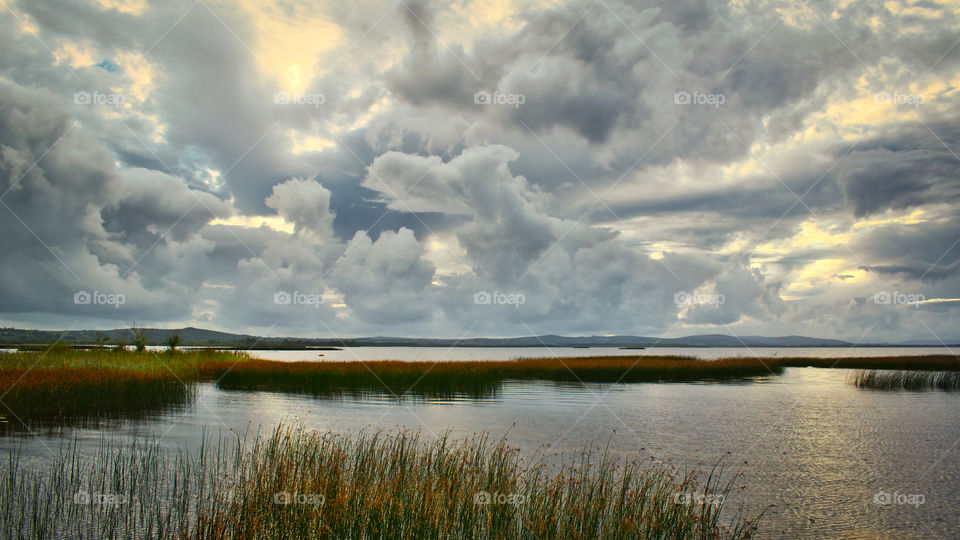 Dramatic cloudy skies over Corrib lake in Galway, Ireland