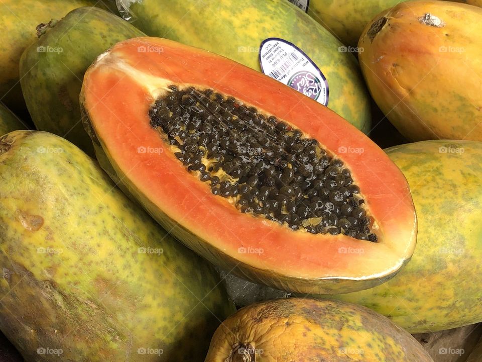 Colorful papaya at Pike Place Market in Seattle Washington.