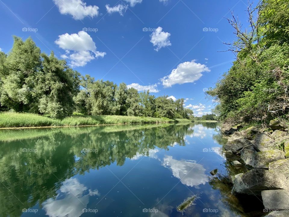 water landscape grass and clouds 