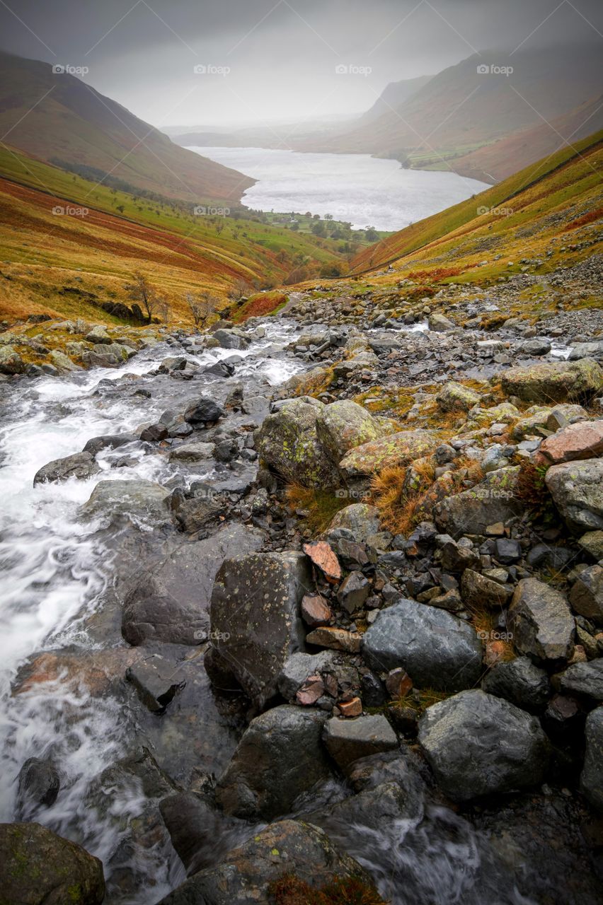 Stream flowing over mountains