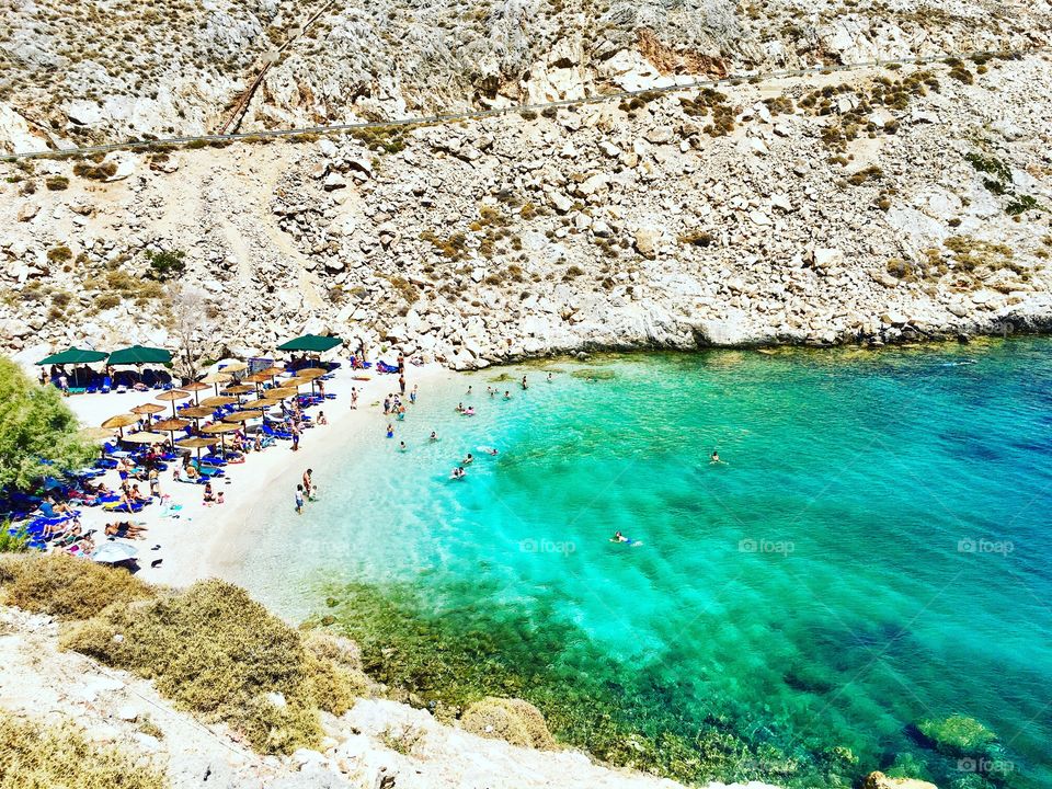 Private beach Chios, Greece - green waters. Secluded cove beach party 