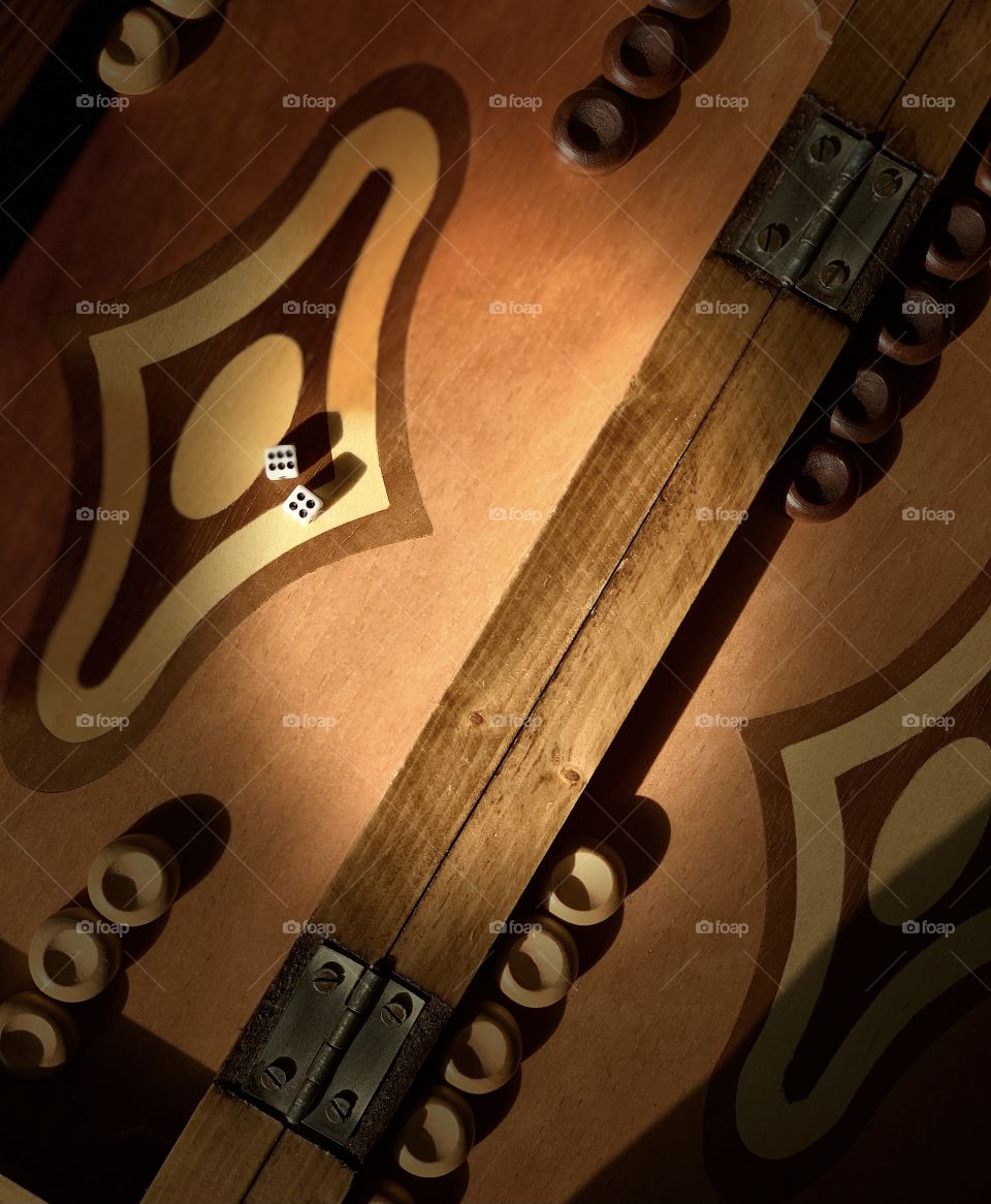 Backgammon in shadow