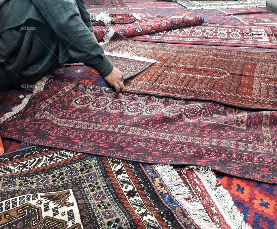 old Afghan wool carpet from a carpet bazar