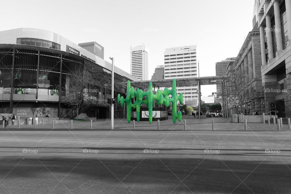 Monochrome street snap added one green pointed colour to the statue called the Cactus, which situated in Forrest Place, Perth, Western Australia.