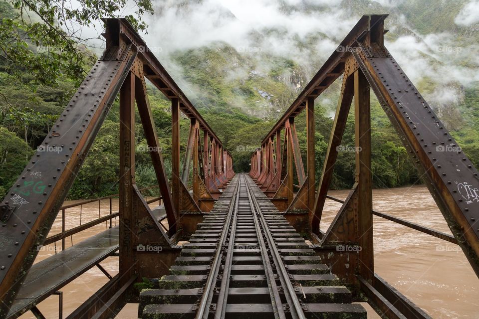 Old railway bridge over river