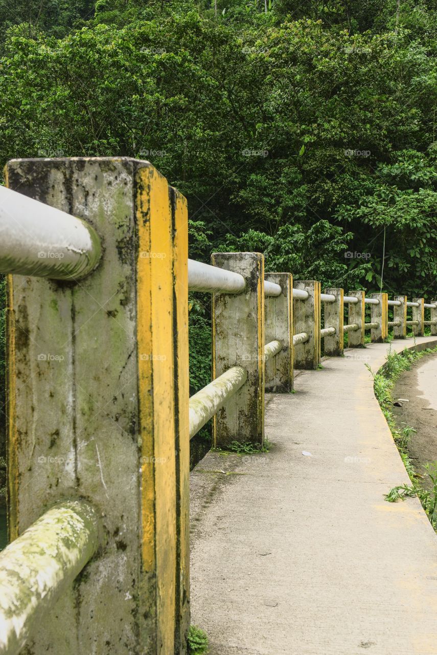 Perspective of protection posts of a bridge over a roadway