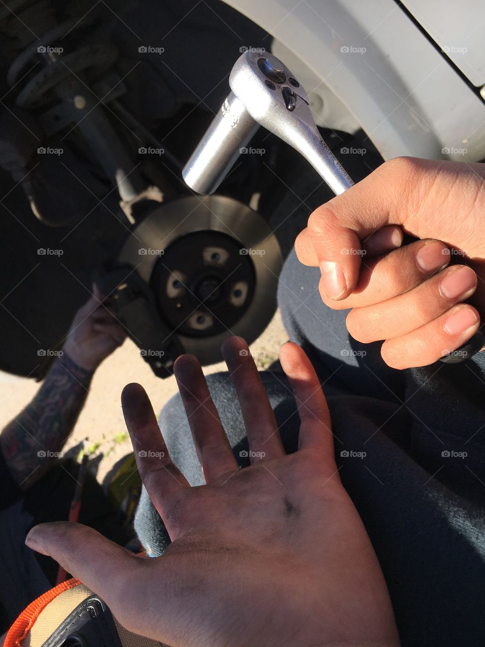 Repairing disk brakes on car