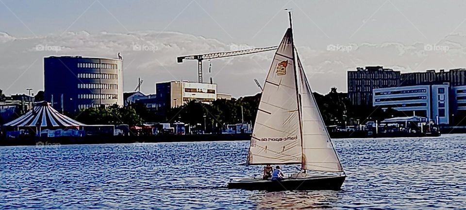 Theis is by comparison a small private sailing vessels. Some of the larger sailboats that are anchored here and book daily tours have several masts and five rows of sails getting the schooner around. 2022. Hypnotic Productions