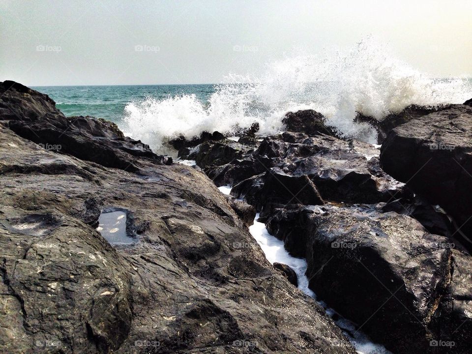 Waves breaking on the rocks