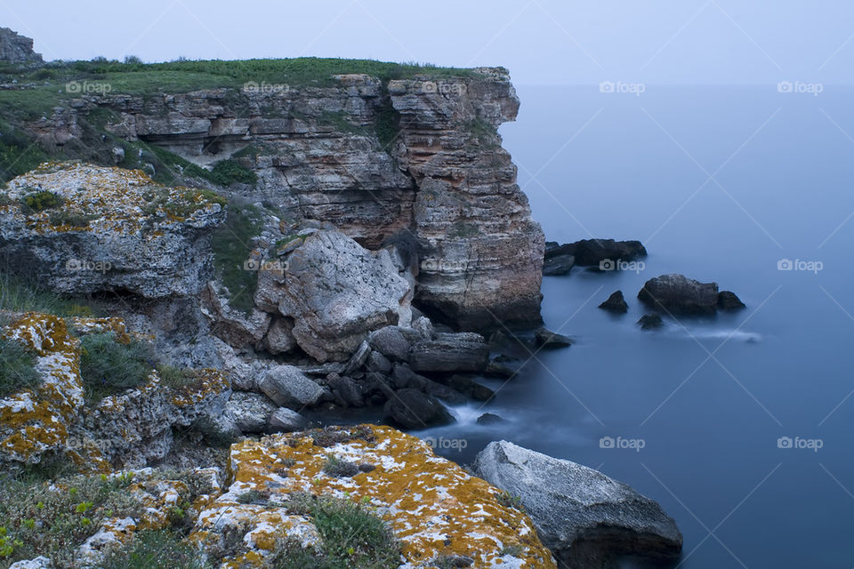 evening view of cliffs above the sea