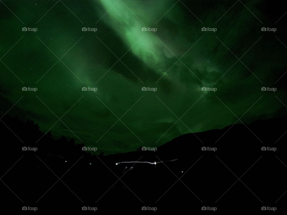 Any movement caught while taking a picture of the northern lights are delicate. Like other people taking a picture of the lights in front of you
