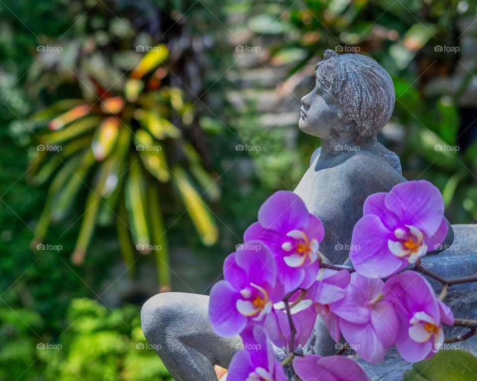 statue and flowers