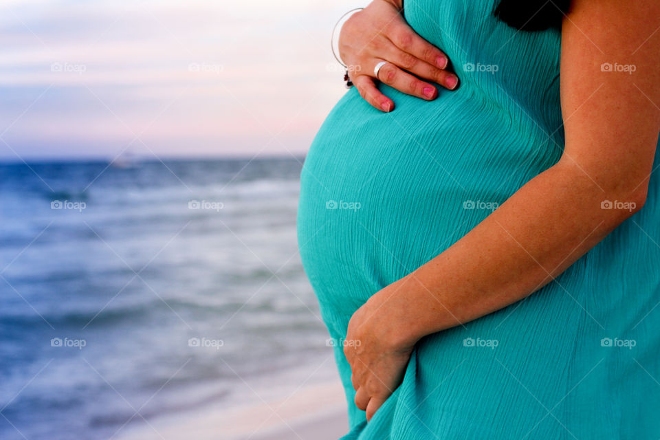 pregnant  women on beach