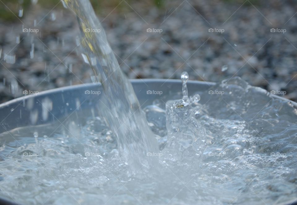 pouring in a bucket