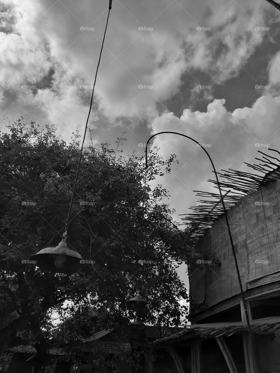 Monochrome style of the hanging lamp of a beach club