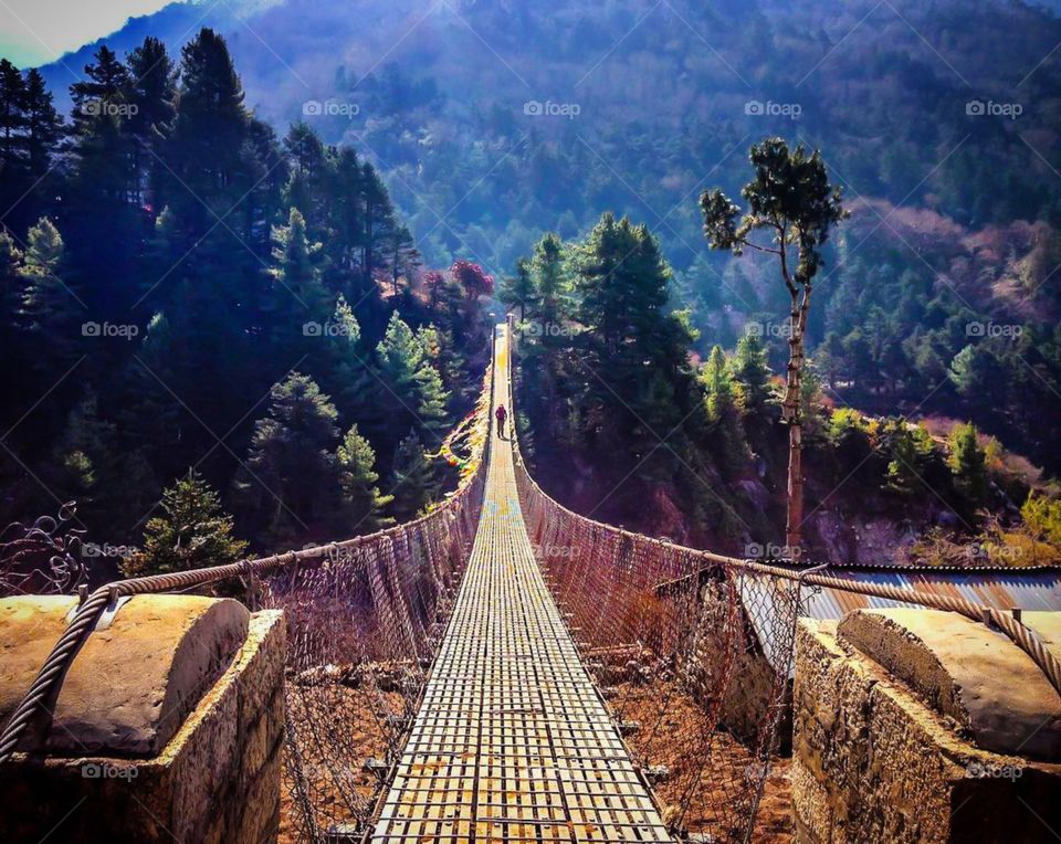 Getting ready to cross another walking bridge on the way to Tengboche. Nepal is full of these walking bridges and a normal trek will require you to cross tons of them on your journey. Photo taken on the Everest Base Camp Trek in Nepal.