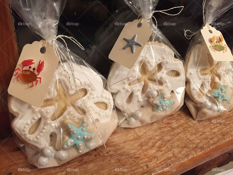 Sea themed decorative bags of sugar cookies for a bridal shower. 