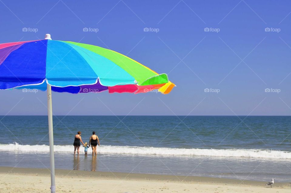 Beach umbrella. A sunny day at the beach