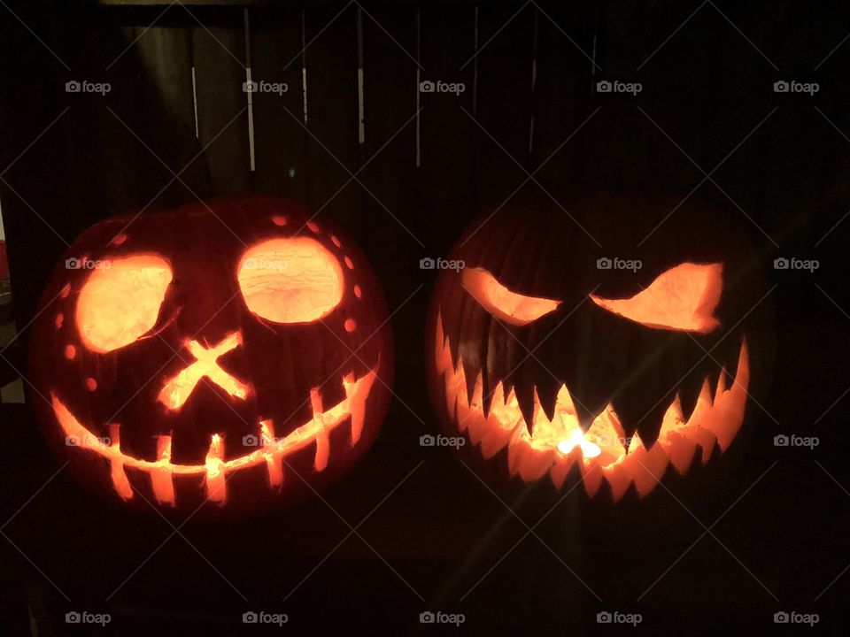 Carved lit pumpkins for Halloween.