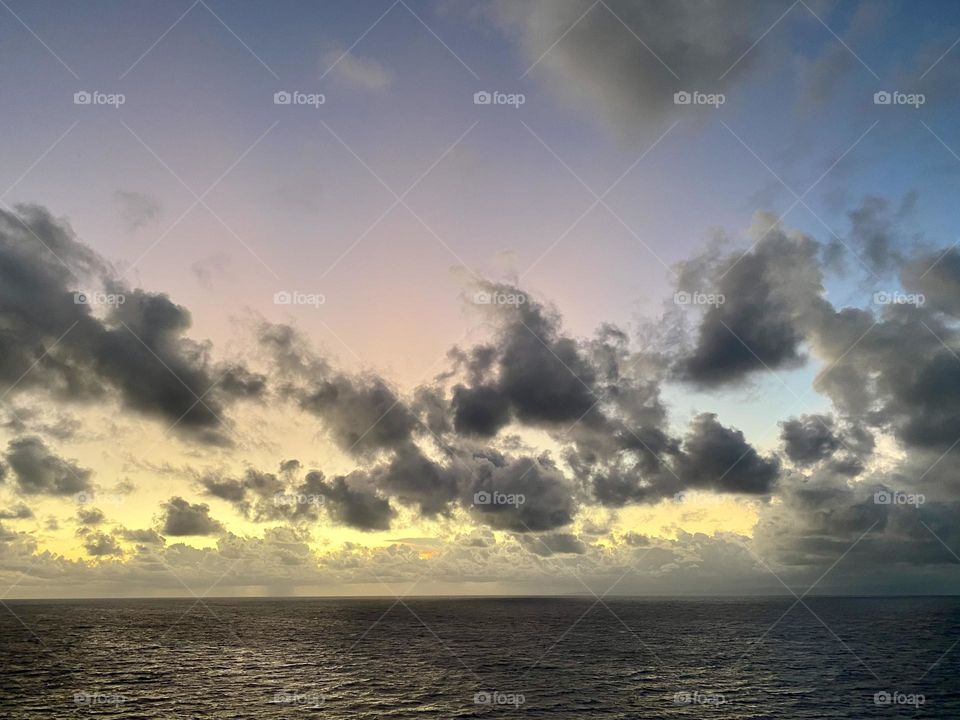 A sunset viewed from the deck of a cruise ship