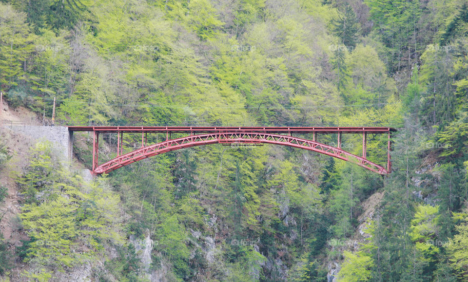 red bridge with mountain in switzerland