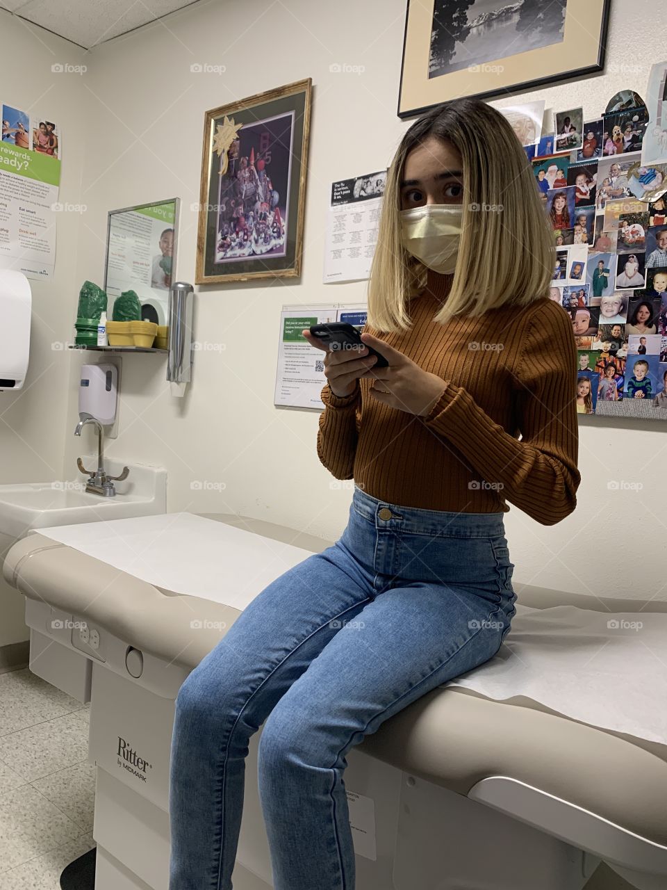 My 11 year old daughter at the doctor’s office with a bad cold and asthma. She’s doing a lot better now. 