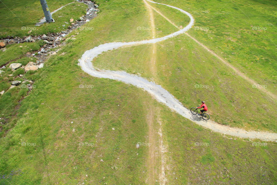 ride bicycle on the beautiful way ischgl mountain austria in summer