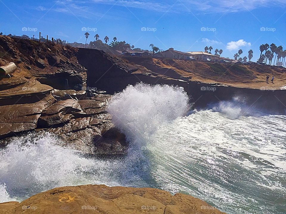 Waves crashing on rocks at beach