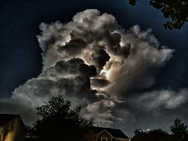 Darken picture of heat lightning on a hot summer night 
