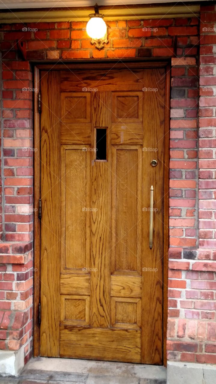 Quaint little wooden side door at St Lawrence Basilica in Asheville